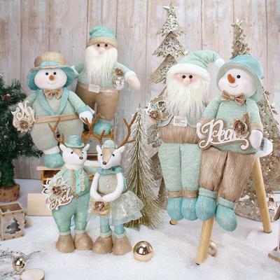 Stuffing gold cream aquamarine blue Christmas gifts and decoration Santa snowmen reindeer angels nut cracker soldiers figures tree skirt stockings wreath